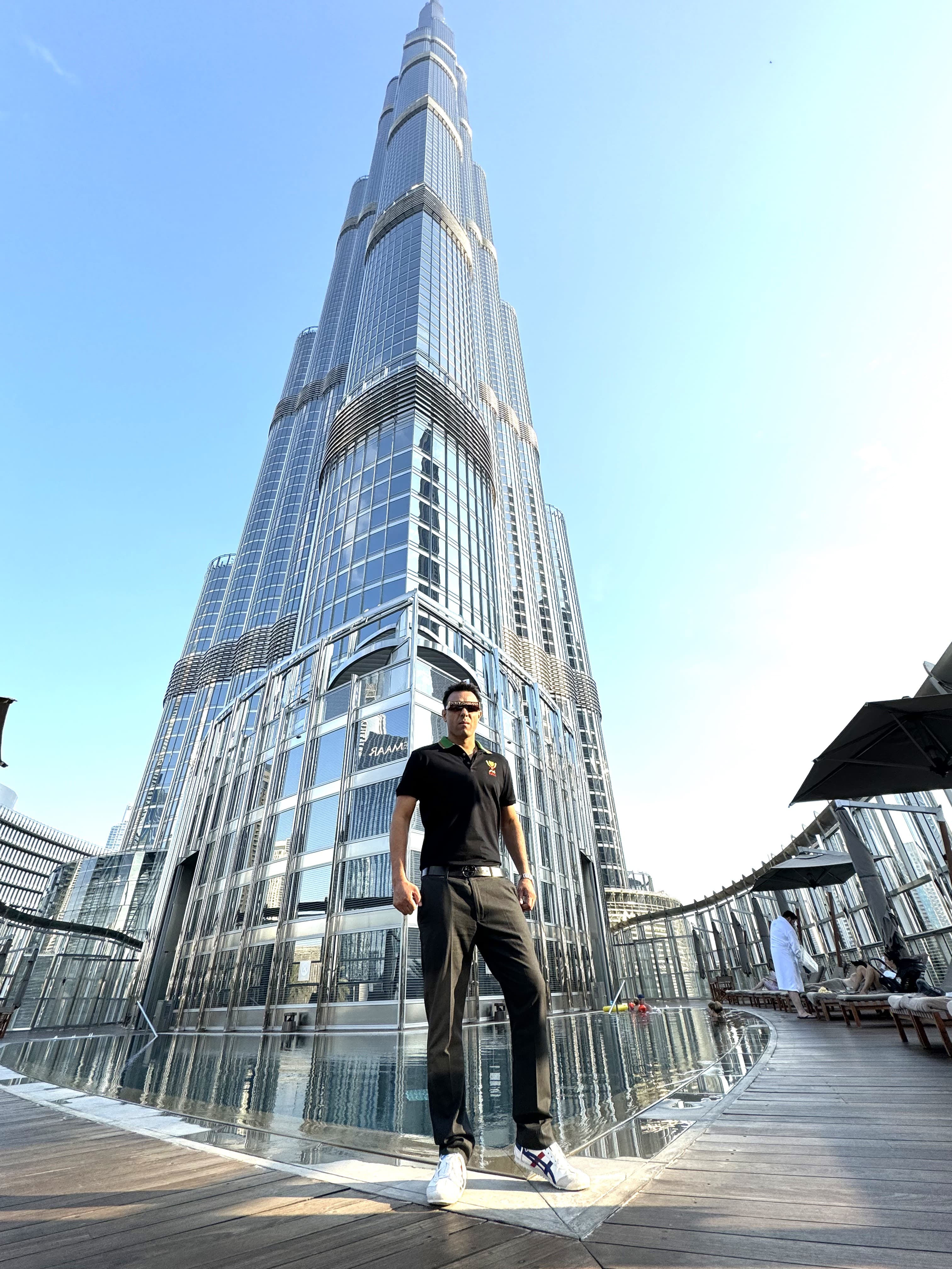 FYTBYRAJ founder standing in front of Burj Khalifa